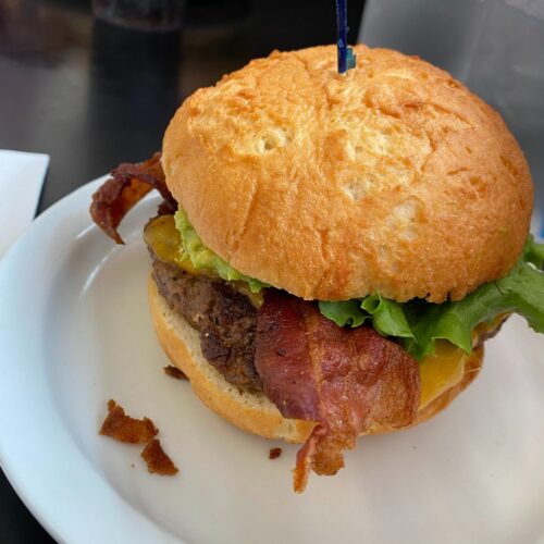 This image is of a gluten free bacon burger.