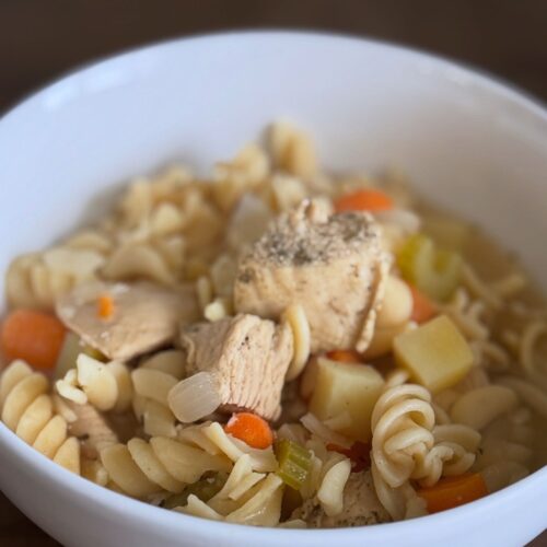 This image is of gluten free chicken noodle soup.