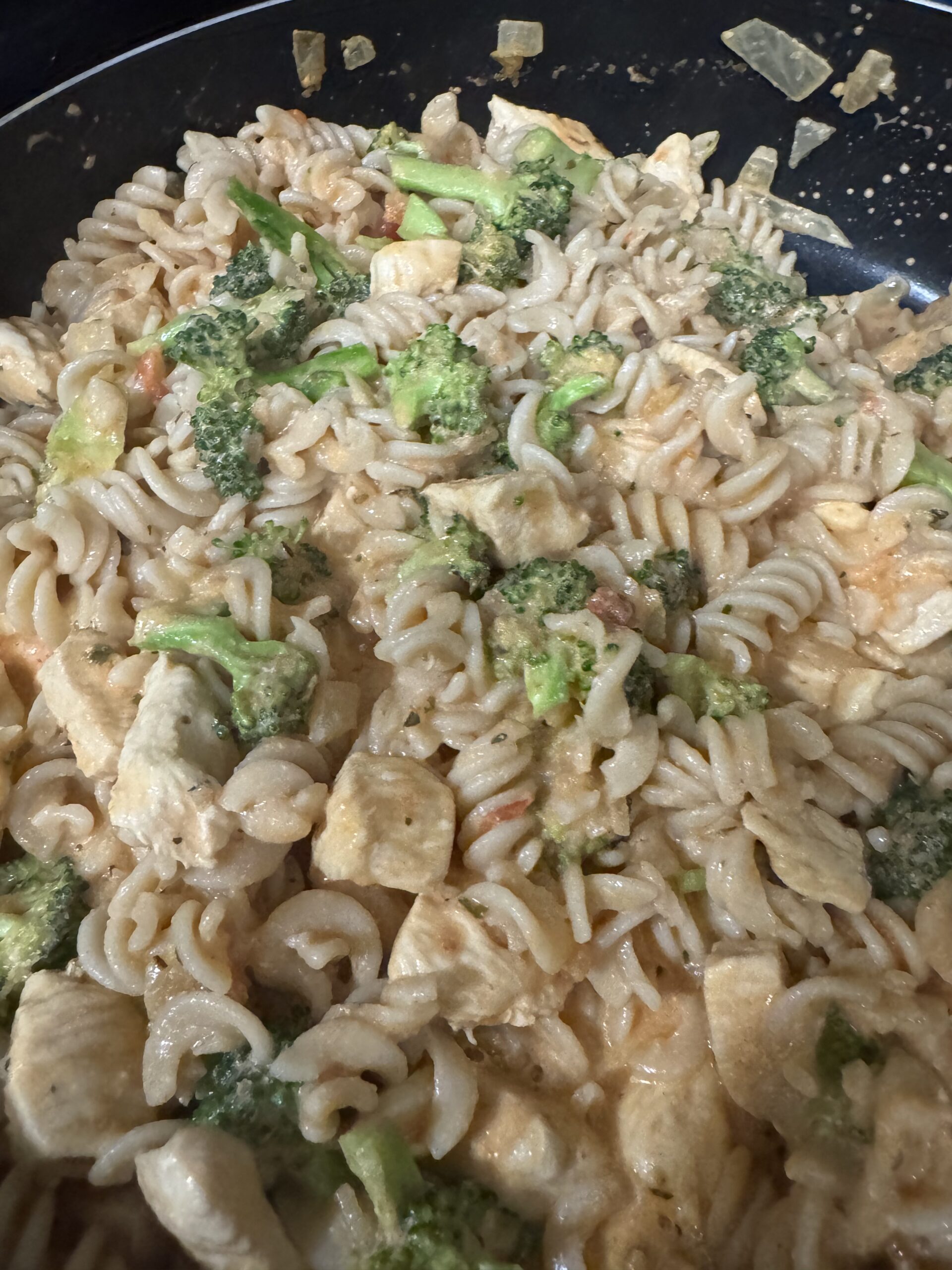 This image is the final product of gluten free rotini pasta in a pan.